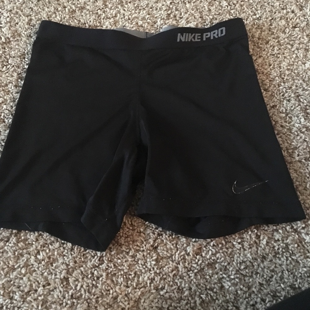 Nike pro shorts (Nike emblem fading)